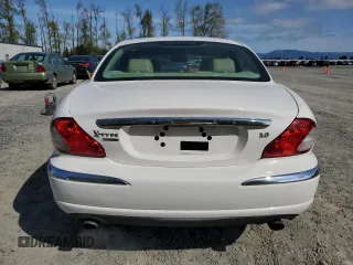 2006 Jaguar X-Type with VIN SAJWA51A06WE68591, listed as a Copart auction lot 53020355 with 179,379 mi miles and Salvage Title. Bid and sale history available at DreamBid. Image 6.