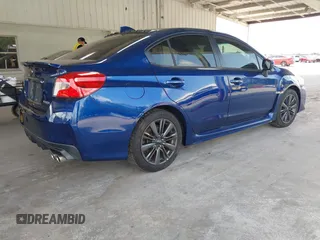 2015 Subaru WRX with VIN JF1VA1A60F9833285, listed as a IAAI auction lot 42127612 with 100,035 mi miles and . Bid and sale history available at DreamBid. Image 4.