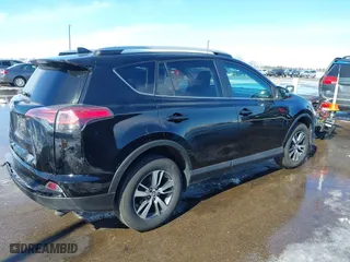 2016 Toyota RAV4 XLE with VIN 2T3RFREV1GW410956, listed as a IAAI auction lot 41739007 with 108,642 mi miles. Bid and sale history available at carsss.com. Image 4.