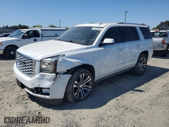 2020 GMC Yukon Denali with VIN 1GKS2CKJ0LR109590, listed as a Copart auction lot 68700384 with 55,310 mi miles and Salvage Title. Bid and sale history available at carsss.com. Image 1.