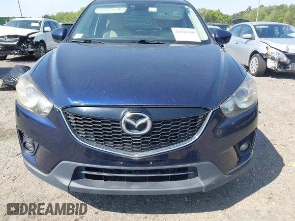 2014 Mazda CX-5 Grand Touring with VIN JM3KE4DYXE0342720, listed as a IAAI auction lot 42026388 with 114,072 mi miles and . Bid and sale history available at carsss.com. Image 13.