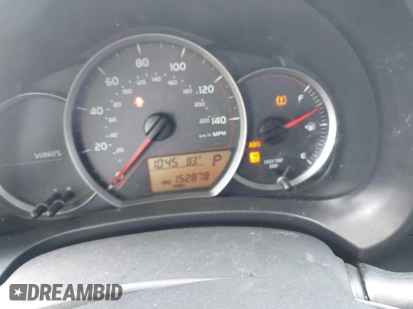 2012 Toyota Yaris L with VIN JTDKTUD38CD540219, listed as a IAAI auction lot 42091750 with 152,878 mi miles. Bid and sale history available at carsss.com. Image 7.