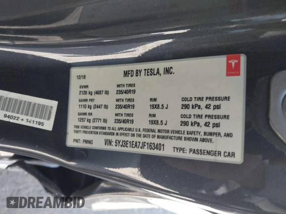2018 Tesla Model 3 Long Range Battery with VIN 5YJ3E1EA7JF163401, listed as a IAAI auction lot 41829681 with 90,065 mi miles. Bid and sale history available at carsss.com. Image 9.