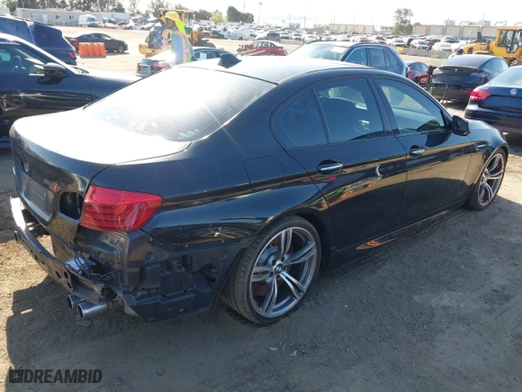 2014 BMW M5 with VIN WBSFV9C56ED097611, listed as a IAAI auction lot 41845196 with 72,215 mi miles. Bid and sale history available at carsss.com. Image 4.