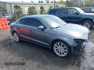 2015 Audi A3 Premium Plus z VIN WAUCJGFF4F1078134, wystawiony jako IAAI lot #41909858 z przebiegiem 92 413 mil mil oraz . Historia ofert i sprzedaży dostępna na DreamBid. Obrazek 1.