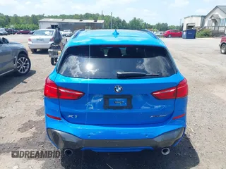 2021 BMW X1 xDrive28i with VIN WBXJG9C04M5T61811, listed as a IAAI auction lot 42509852 with 30,400 mi miles and . Bid and sale history available at DreamBid. Image 16.