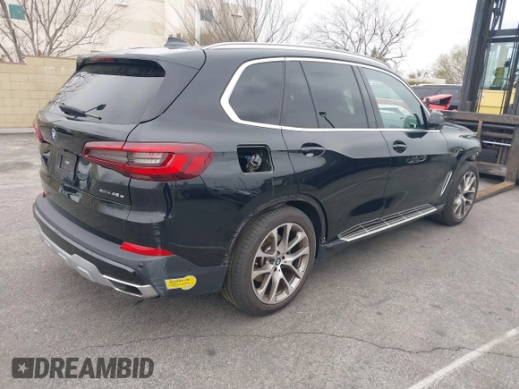 2022 BMW X5 xDrive45e with VIN 5UXTA6C08N9K85766, listed as a IAAI auction lot 41461039 with 95,003 mi miles. Bid and sale history available at carsss.com. Image 4.