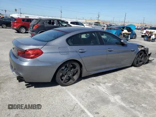 2015 BMW M6 z VIN WBS6C9C56FD467608, wystawiony jako Copart lot #67796074 z przebiegiem 67 706 mil mil oraz Szkoda całkowita • Salvage title. Historia ofert i sprzedaży dostępna na DreamBid. Obrazek 3.