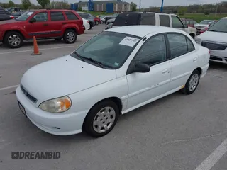 2002 Kia Rio with VIN KNADC123926185376, listed as a IAAI auction lot 42027348 with 84,893 mi miles. Bid and sale history available at carsss.com. Image 2.