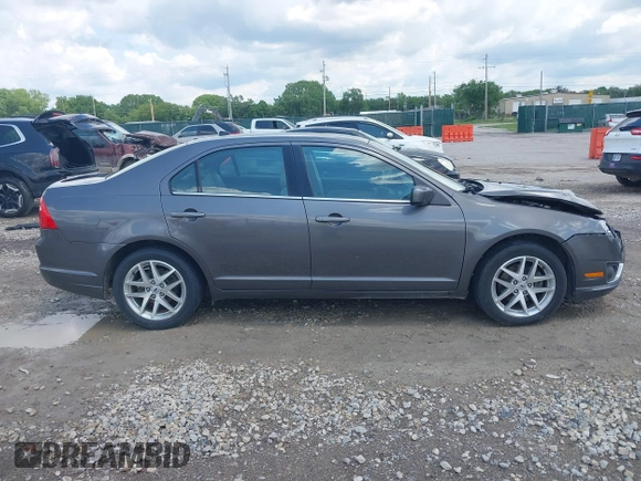 2012 Ford Fusion SEL z VIN 3FAHP0JG4CR265377, wystawiony jako IAAI lot #42221191 z przebiegiem 154 442 mil mil oraz . Historia ofert i sprzedaży dostępna na DreamBid. Obrazek 13.