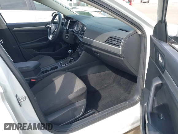 2021 Volkswagen Jetta S z VIN 3VWC57BU0MM021874, wystawiony jako IAAI lot #42124747 z przebiegiem 89 887 mil mil oraz . Historia ofert i sprzedaży dostępna na DreamBid. Obrazek 5.