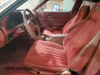 1981 Datsun 280ZX z VIN JN1HZ04S1BX414616, wystawiony jako Copart lot #82249204 z przebiegiem 114 028 mil mil oraz Tytuł czysty. Historia ofert i sprzedaży dostępna na DreamBid. Obrazek 7.