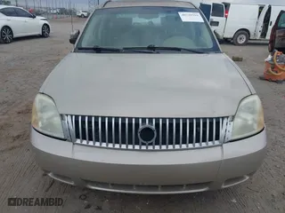 2005 Mercury Montego with VIN 1MEHM40195G606109, listed as a IAAI auction lot 40739316 with 329,715 mi miles. Bid and sale history available at carsss.com. Image 6.