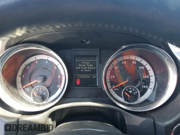 2012 Dodge Durango R/T z VIN 1C4SDJCT5CC195878, wystawiony jako Copart lot #50727765 z przebiegiem 217 623 mil mil oraz Czysty tytuł • Clean title. Historia ofert i sprzedaży dostępna na DreamBid. Obrazek 9.