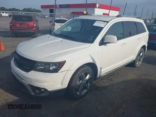 2015 Dodge Journey Crossroad with VIN 3C4PDCGG6FT588666, listed as a IAAI auction lot 42452044 with 238,566 mi miles and . Bid and sale history available at DreamBid. Image 2.