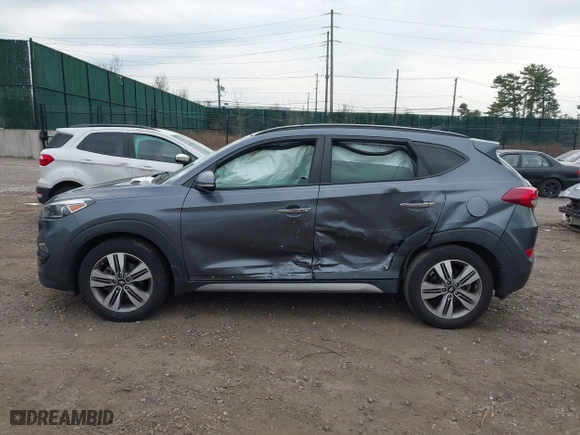 2017 Hyundai Tucson Value with VIN KM8J33A21HU359113, listed as a IAAI auction lot 41897638 with 80,010 mi miles. Bid and sale history available at carsss.com. Image 14.