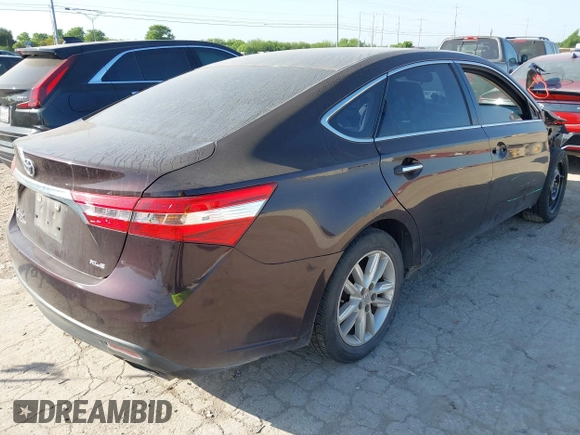 2013 Toyota Avalon XLE with VIN 4T1BK1EB6DU039057, listed as a IAAI auction lot 42011057 with 127,313 mi miles and . Bid and sale history available at DreamBid. Image 4.