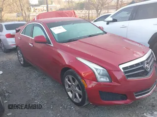 2013 Cadillac ATS z VIN 1G6AA5RA1D0138827, wystawiony jako IAAI lot #41773448 z przebiegiem 180 895 mil mil oraz . Historia ofert i sprzedaży dostępna na DreamBid. Obrazek 1.