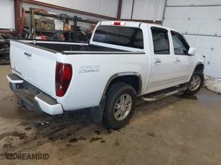 2012 Chevrolet Colorado LT w/1LT with VIN 1GCHTCFE3C8103014, listed as a IAAI auction lot 41267468 with 165,491 mi miles. Bid and sale history available at carsss.com. Image 4.