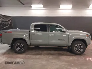 2023 Toyota Tacoma 4WD SR with VIN 3TMCZ5ANXPM607489, listed as a IAAI auction lot 41605018 with 15,229 mi miles. Bid and sale history available at carsss.com. Image 13.