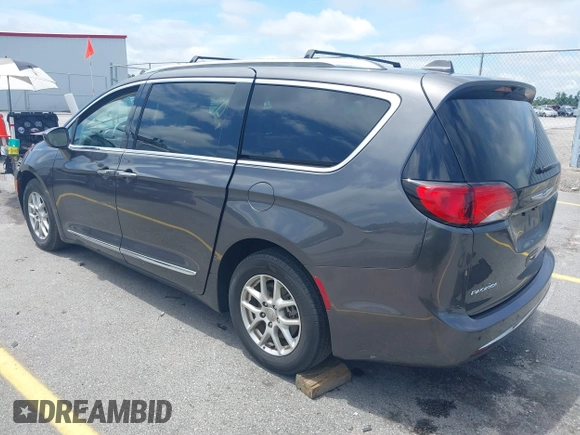 2020 Chrysler Pacifica Touring L with VIN 2C4RC1BG1LR269004, listed as a IAAI auction lot 42287228 with 71,498 mi miles and . Bid and sale history available at DreamBid. Image 3.