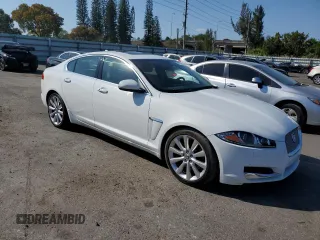 2014 Jaguar XF SC with VIN SAJWA0EX6E8U22068, listed as a Copart auction lot 48970025 with 51,218 mi miles and Clean Title. Bid and sale history available at DreamBid. Image 4.