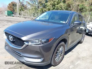 2017 Mazda CX-5 Touring with VIN JM3KFBCL2H0203497, listed as a IAAI auction lot 41860782 with 65,482 mi miles. Bid and sale history available at carsss.com. Image 17.