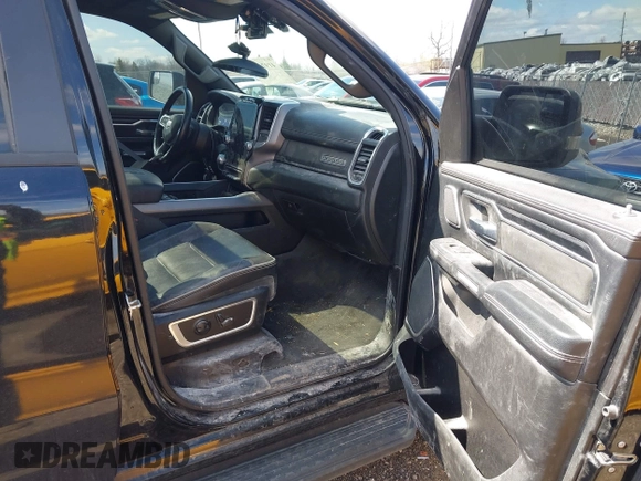 2023 Ram 1500 Laramie with VIN 1C6SRFJT6PN542105, listed as a IAAI auction lot 41974428 with 74,489 mi miles and . Bid and sale history available at DreamBid. Image 5.