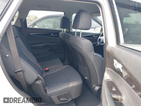 2019 Kia Sorento LX with VIN 5XYPG4A54KG599963, listed as a IAAI auction lot 41558055 with 119,238 mi miles and . Bid and sale history available at DreamBid. Image 8.