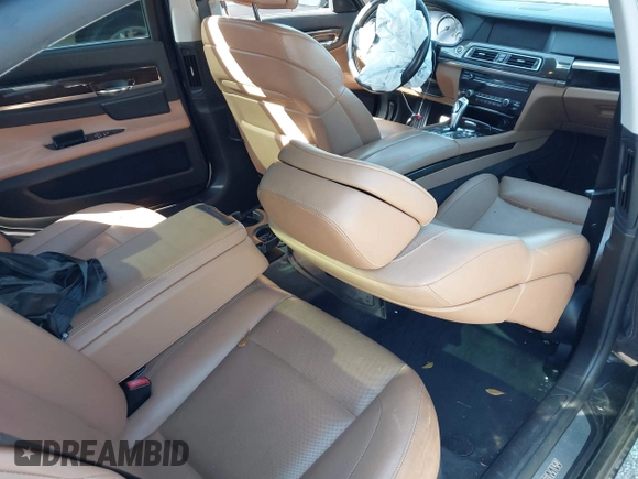 2012 BMW 7 Series 750Li xDrive with VIN WBAKC8C53CC435553, listed as a IAAI auction lot 41852097 with 127,418 mi miles and . Bid and sale history available at DreamBid. Image 8.