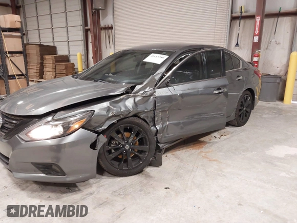 2018 Nissan Altima 2.5 SR with VIN 1N4AL3AP1JC203798, listed as a IAAI auction lot 41853789 with 77,875 mi miles. Bid and sale history available at carsss.com. Image 6.
