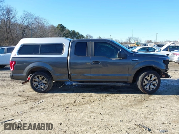 2015 Ford F-150 XL with VIN 1FTEX1C85FKD46390, listed as a IAAI auction lot 41367960 with 209,889 mi miles. Bid and sale history available at carsss.com. Image 14.