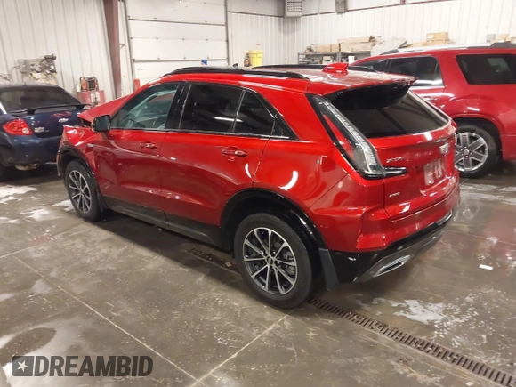 2024 Cadillac XT4 AWD Sport z VIN 1GYFZFR42RF154352, wystawiony jako IAAI lot #41249916 z przebiegiem 27 378 mil mil oraz . Historia ofert i sprzedaży dostępna na DreamBid. Obrazek 3.