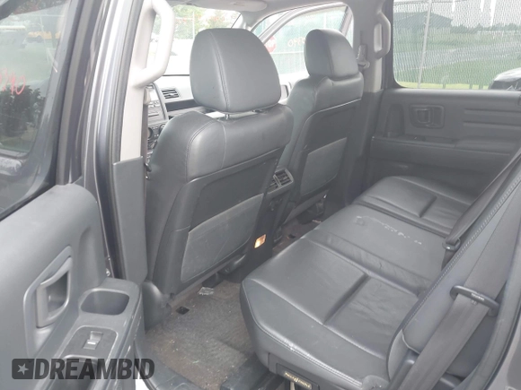 2014 Honda Ridgeline RTL with VIN 5FPYK1F5XEB011772, listed as a IAAI auction lot 42440390 with 145,219 mi miles and . Bid and sale history available at DreamBid. Image 8.