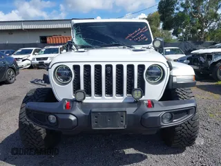 2022 Jeep Wrangler Unlimited Rubicon with VIN 1C4HJXFG8NW130156, listed as a IAAI auction lot 42004630 with 129,313 mi miles and . Bid and sale history available at DreamBid. Image 12.