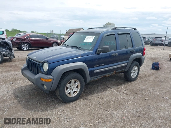 2002 Jeep Liberty Sport with VIN 1J4GL48K42W260513, listed as a IAAI auction lot 42163192 with 146,789 mi miles. Bid and sale history available at carsss.com. Image 2.
