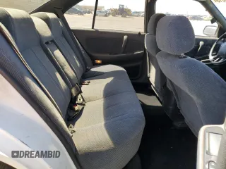 1990 Nissan Maxima z VIN JN1HJ01PXLT390008, wystawiony jako Copart lot #53529815 z przebiegiem 163 186 mil mil oraz Tytuł czysty. Historia ofert i sprzedaży dostępna na DreamBid. Obrazek 10.