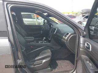 2018 Jeep Grand Cherokee Laredo E with VIN 1C4RJFAG7JC294905, listed as a IAAI auction lot 42452977 with 75,916 mi miles and . Bid and sale history available at DreamBid. Image 5.