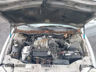 1997 Ford Taurus GL z VIN 1FALP52UXVG180596, wystawiony jako IAAI lot #42463461 z przebiegiem 190 419 mil mil oraz . Historia ofert i sprzedaży dostępna na DreamBid. Obrazek 10.