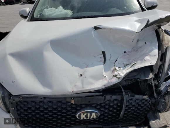 2017 Kia Sorento LX z VIN 5XYPG4A34HG220340, wystawiony jako Copart lot #57467775 z przebiegiem 144 612 mil mil oraz Szkoda całkowita • Salvage title. Historia ofert i sprzedaży dostępna na DreamBid. Obrazek 12.