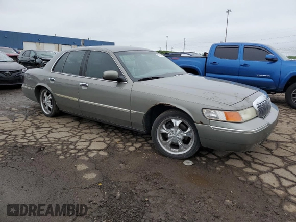 2000 Mercury Grand Marquis LS z VIN 2MEFM75WXYX742065, wystawiony jako Copart lot #57655795 z przebiegiem 175 070 mil mil oraz Tytuł czysty. Historia ofert i sprzedaży dostępna na DreamBid. Obrazek 4.