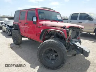 2015 Jeep Wrangler Unlimited Willys Wheeler with VIN 1C4BJWDG9FL750505, listed as a IAAI auction lot 41781762 with 139,000 mi miles and . Bid and sale history available at DreamBid. Image 1.