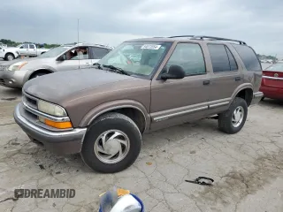 1998 Chevrolet Blazer LS z VIN 1GNDT13W7W2126083, wystawiony jako Copart lot #54073554 z przebiegiem 162 676 mil mil oraz Szkoda całkowita • Salvage title. Historia ofert i sprzedaży dostępna na DreamBid. Obrazek 1.
