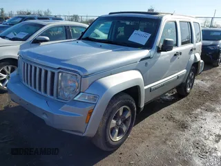 2008 Jeep Liberty Sport with VIN 1J8GN28K68W232640, listed as a IAAI auction lot 41912244 with 143,674 mi miles. Bid and sale history available at carsss.com. Image 2.
