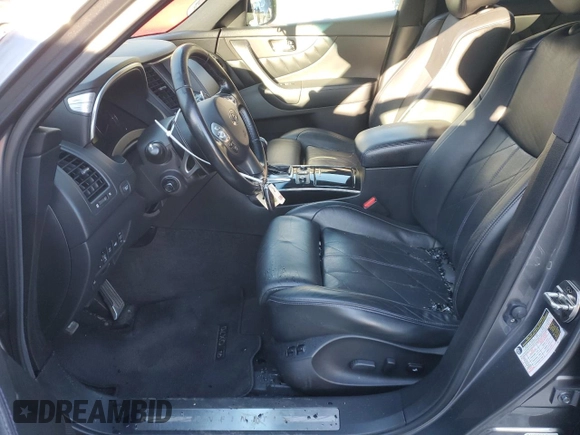 2015 Infiniti QX70 z VIN JN8CS1MW2FM481841, wystawiony jako Copart lot #41459505 z przebiegiem Nie podano mil oraz Szkoda całkowita • Salvage title. Historia ofert i sprzedaży dostępna na DreamBid. Obrazek 7.