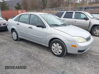 2007 Ford Focus S z VIN 1FAFP34N97W300906, wystawiony jako IAAI lot #41136113 z przebiegiem 209 857 mil mil oraz . Historia ofert i sprzedaży dostępna na DreamBid. Obrazek 1.