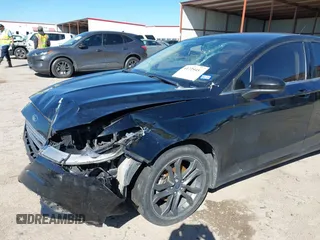 2018 Ford Fusion SE z VIN 3FA6P0H77JR180057, wystawiony jako IAAI lot #41729451 z przebiegiem 122 200 mil mil oraz . Historia ofert i sprzedaży dostępna na DreamBid. Obrazek 6.