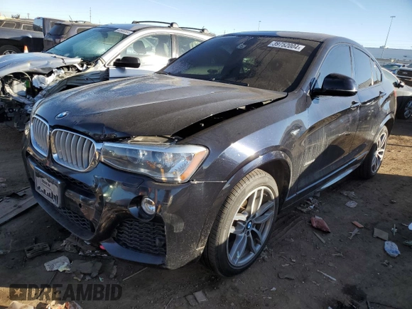 2015 BMW X4 xDrive35i with VIN 5UXXW5C56F0E87474, listed as a Copart auction lot 39752004 with 116,806 mi miles. Bid and sale history available at carsss.com. Image 1.