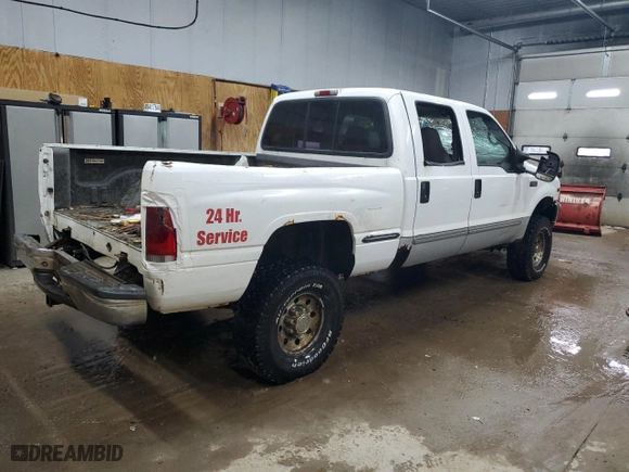1999 Ford Super Duty F-350 SRW XL with VIN 1FTSW31S9XEE99015, listed as a Copart auction lot 49417645 with 128,553 mi miles and Clean Title. Bid and sale history available at carsss.com. Image 3.