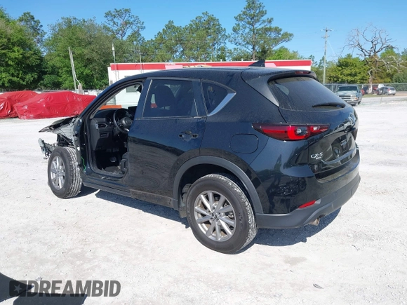 2023 Mazda CX-5 S Preferred with VIN JM3KFBCM7P0188244, listed as a IAAI auction lot 41969630 with 51,058 mi miles and . Bid and sale history available at carsss.com. Image 3.